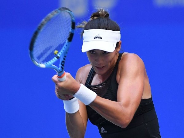 Garbine Muguruza Bertahan Dari Gempuran Wang Xinyu Di Shenzhen