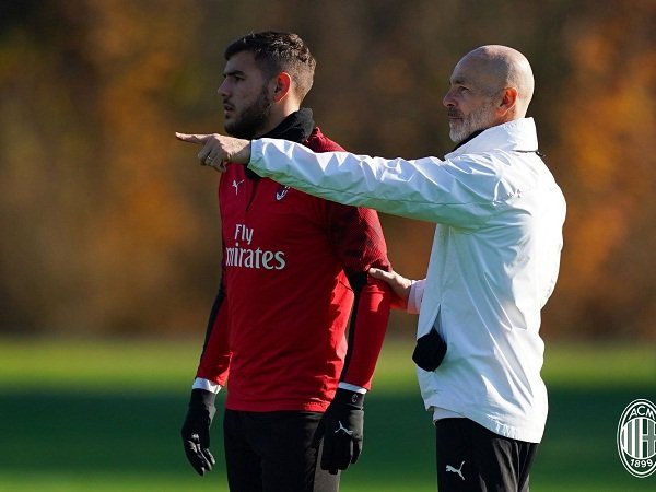 Theo Hernandez dan Stefano Pioli