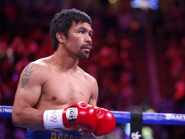 Manny Pacquiao pernah menjadi pembawa bendera Filipina pada Upacara Pembukaan Beijing 2008. (Foto: Inside The Games)