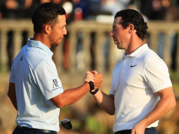 Xander Schauffele (kiri) dan Rory McIlroy. (Foto: Golf Digest)