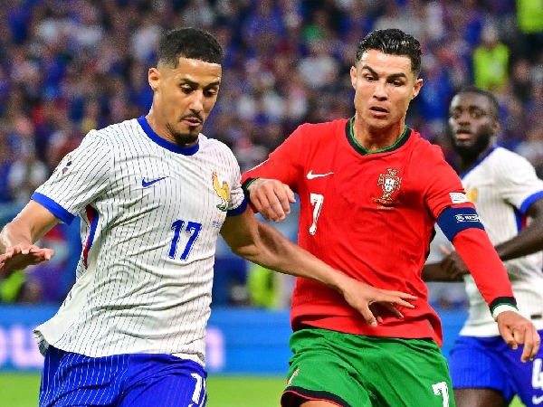 William Saliba saat mengawal Christiano Ronaldo