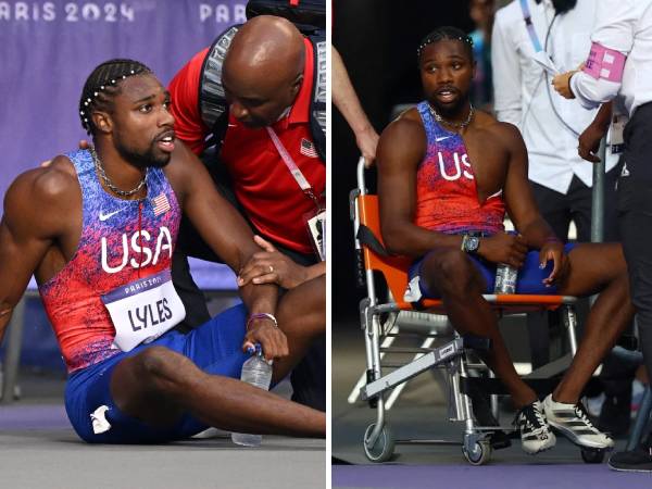 Noah Lyles sempat berbaring telentang di lintasan usai lomba, bahkan ditempatkan di kursi yang akhirnya didorong ke terowongan terdekat. (Foto: AP)