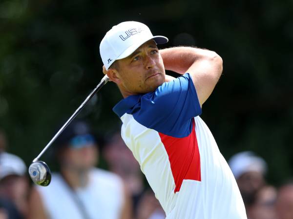 Xander Schauffele beraksi di Olimpiade Paris. (Foto: Golf Digest)