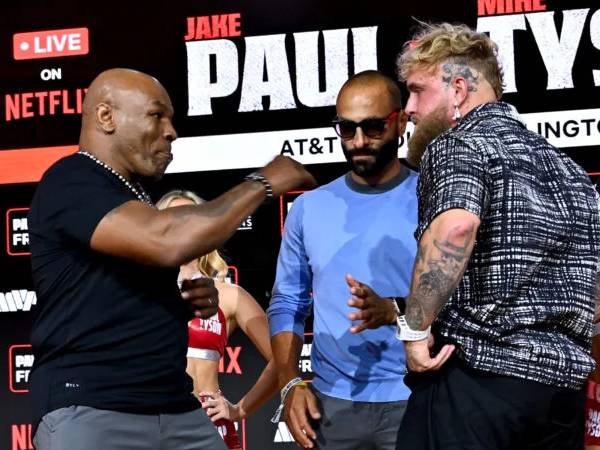 Mike Tyson (kiri) dan Jake Paul kembali berhadapan dalam konferensi pers baru-baru ini. (Foto: Ring TV)