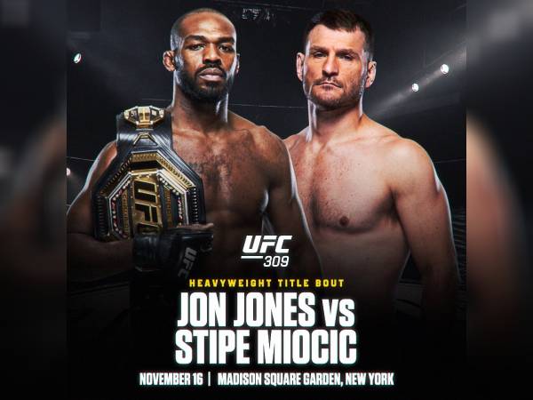 Jon Jones (kiri) dan Stipe Miocic. (Foto: UFC)