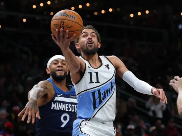 Trae Young mencetak 29 poin saat Atlanta Hawks mengalahkan tim tamu Minnesota Timberwolves 117-104 pada hari Senin (23/12) malam. (Foto: AP)