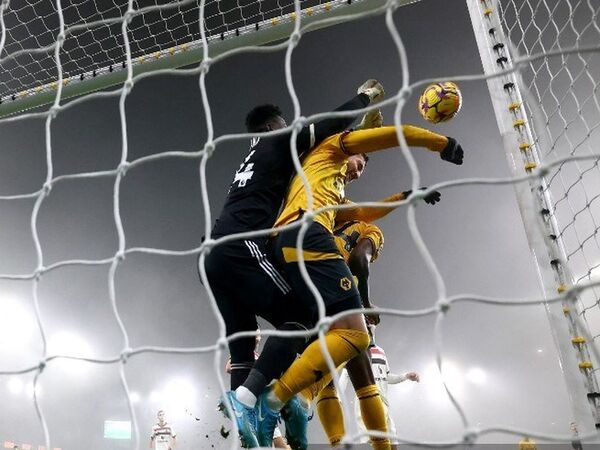 Ruben Amorim enggan menyalahkan Andre Onana, usai Manchester United kembali kebobolan melalui situasi sepak pojok langsung di laga melawan Wolves dini hari tadi (27/12) / via Getty Images